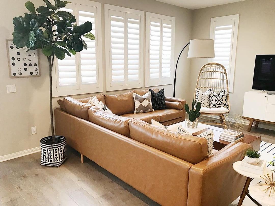 Warm living room with our Polywood shutters in Sacramento.